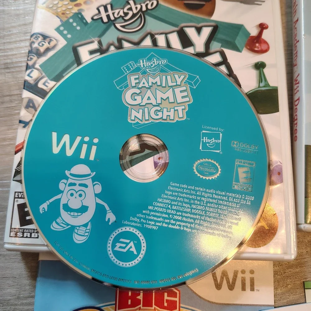 Nintendo Wii Game Lot Hasbro Family Game Night Big Brain Academy Beach Sports